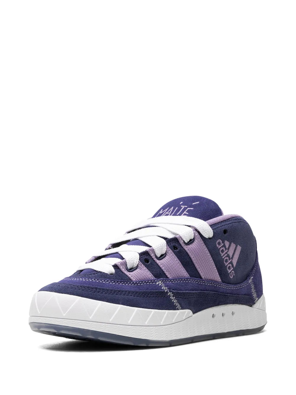 Navy suede mid-top sneaker with white laces, purple heel patch, and white sole