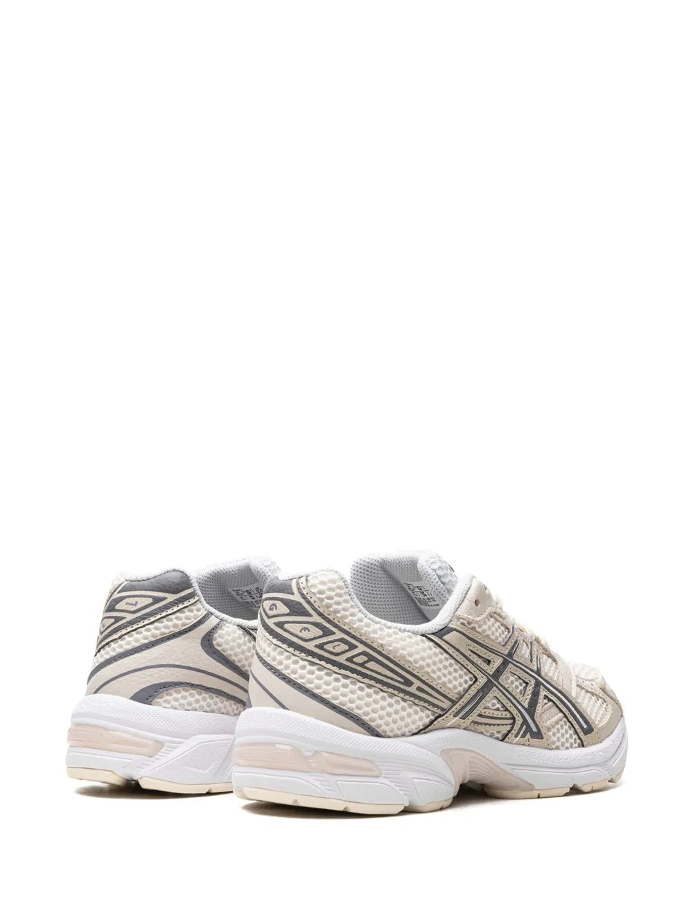 Cream white lace-up sneaker with padded collar and patterned side stripe details
