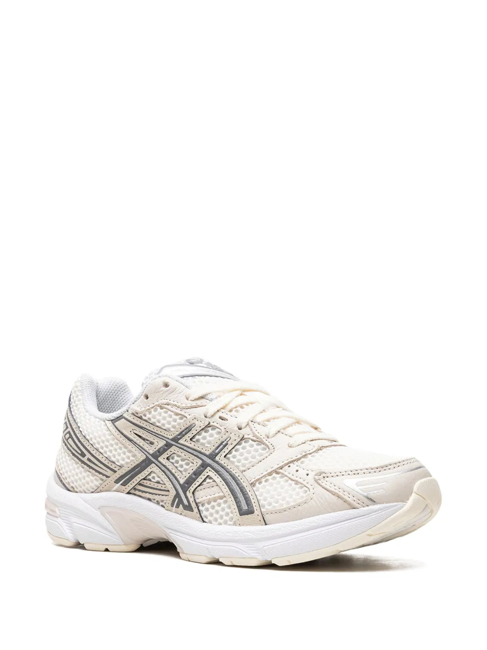 Cream white lace-up running sneaker with patterned mesh side panels and cushioned sole