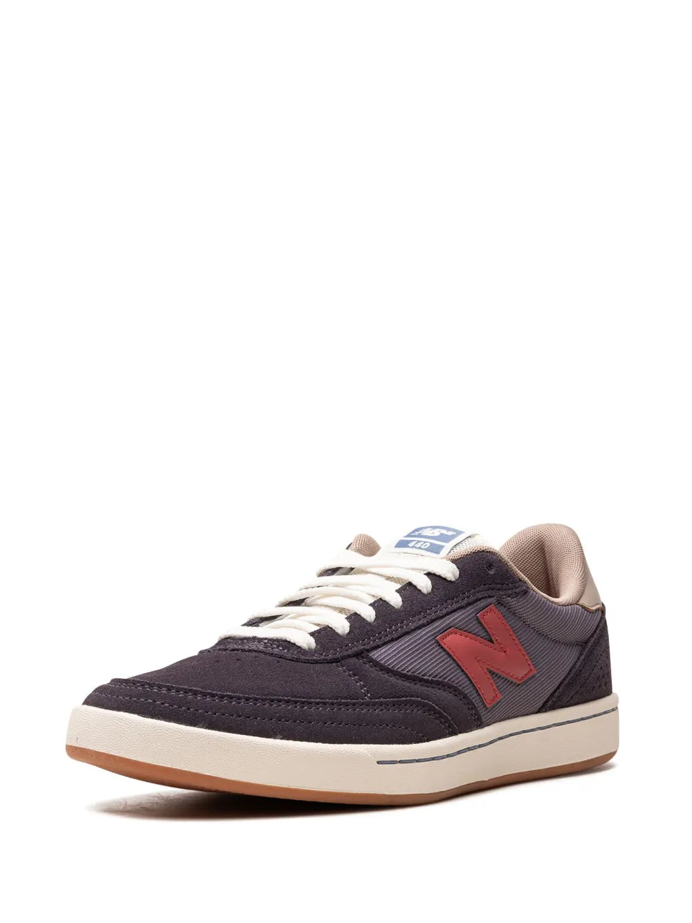 Dark navy sneakers with red N logo, white laces, and beige heel padding