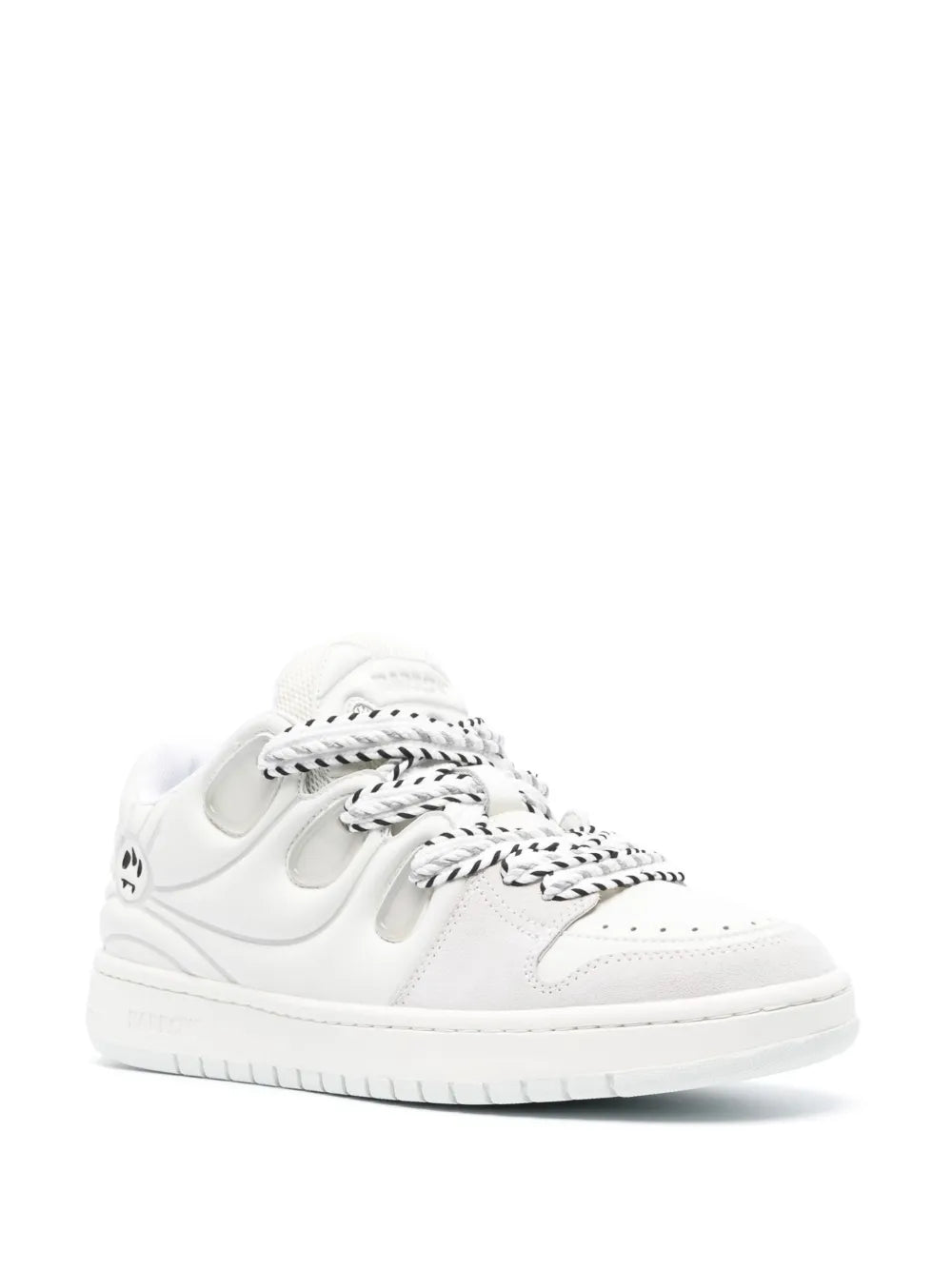 White leather lace-up sneakers with stitched panels and patterned laces
