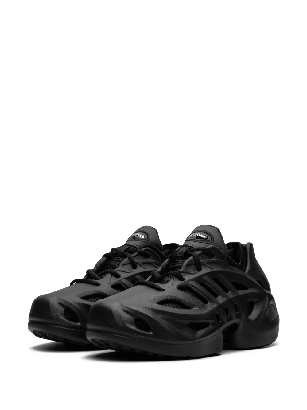 Black adidas lace-up sneakers with rocker sole and slotted ventilation stripes