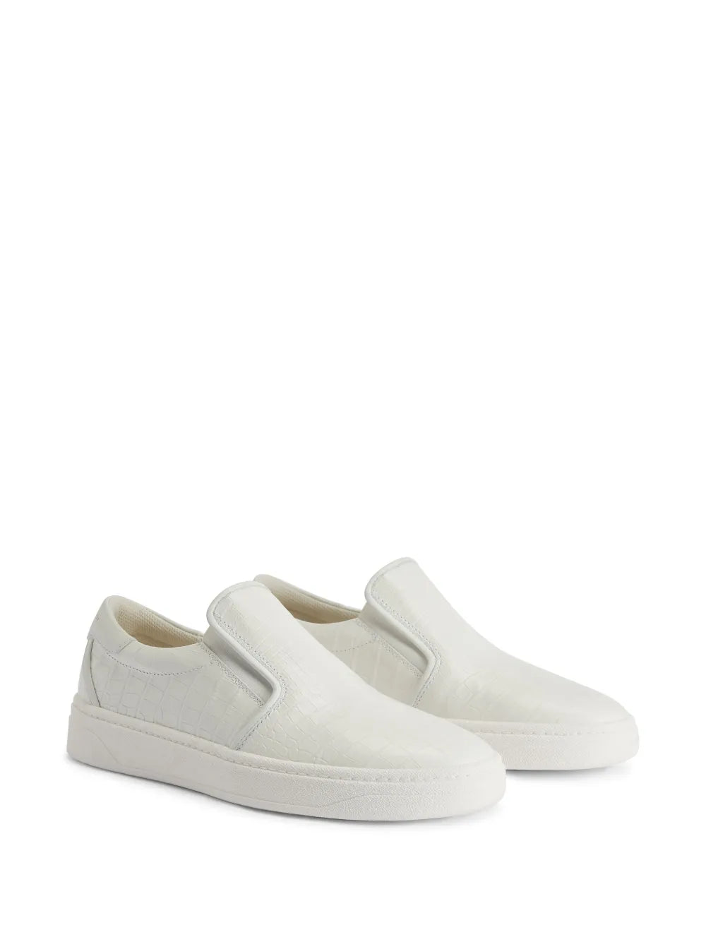 White leather slip-on sneakers with side gore panels and padded collar