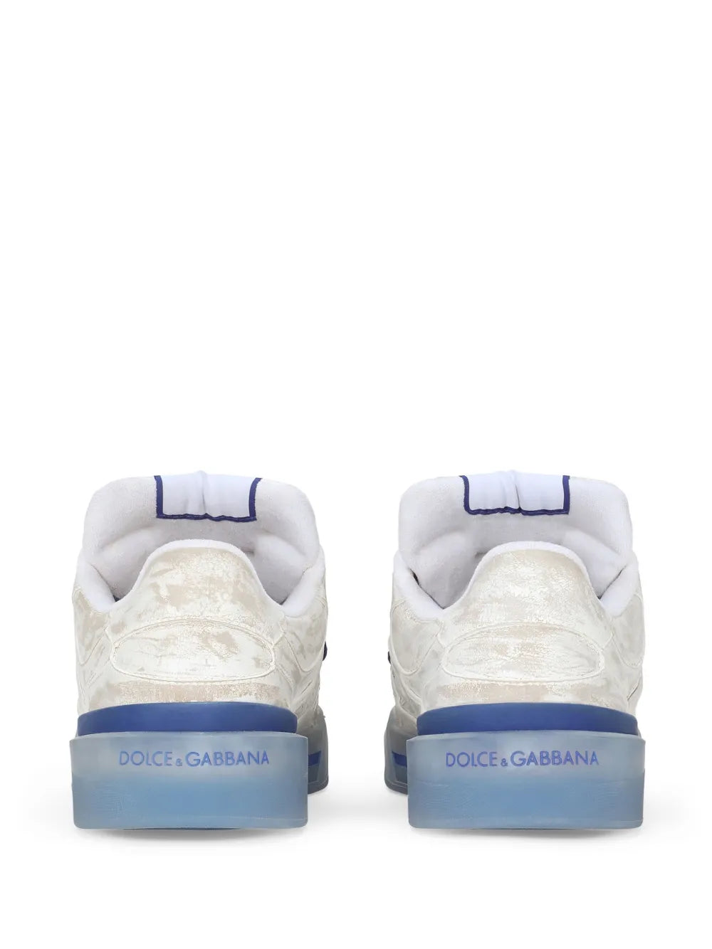 Back view of blue-and-white low-top sneakers with white heel counters and blue rubber soles