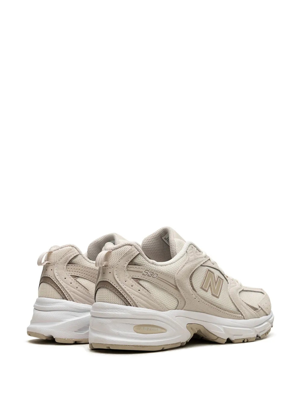 New Balance 530 sneakers, cream off-white, rear quarter view with padded collar