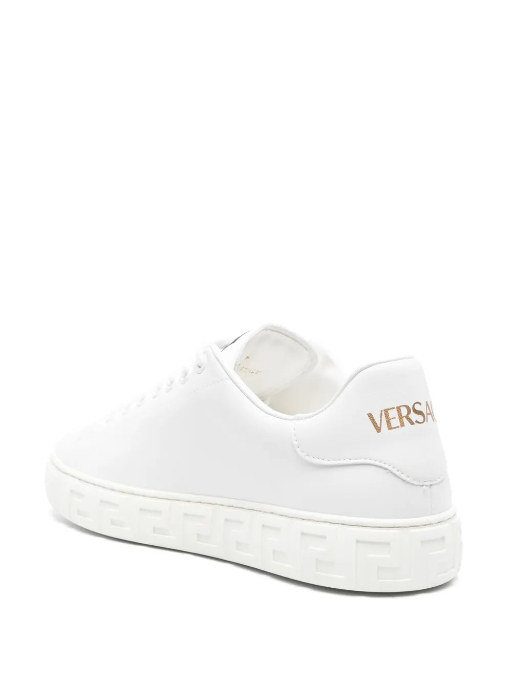 White leather sneaker with gold heel logo tab and patterned platform sole