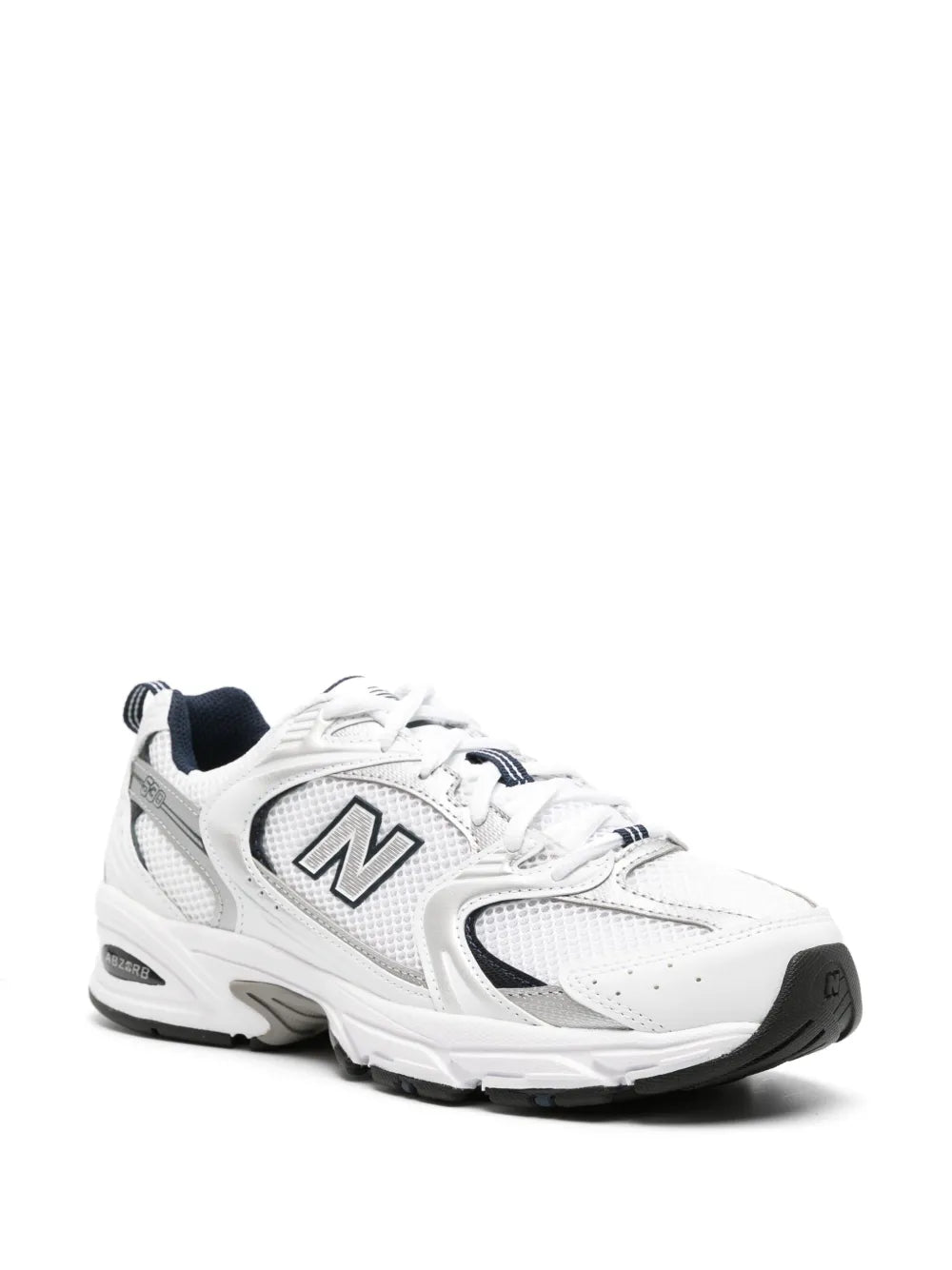 White and navy mesh-panelled sneakers with N logo, angled side view