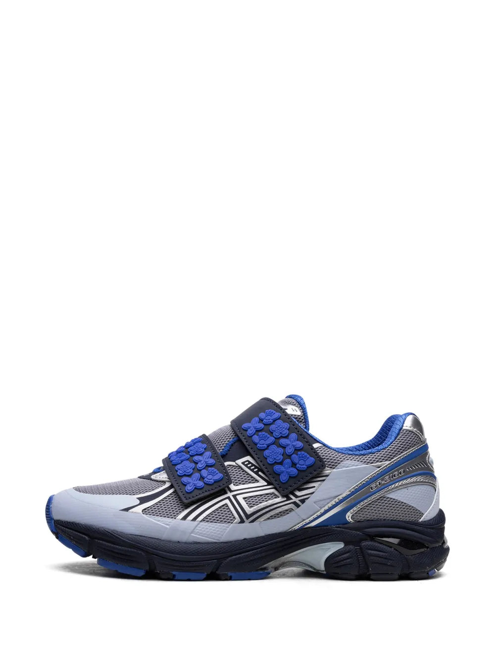 Front view of gray and midnight blue sneakers with blue clover strap accents and silver logo