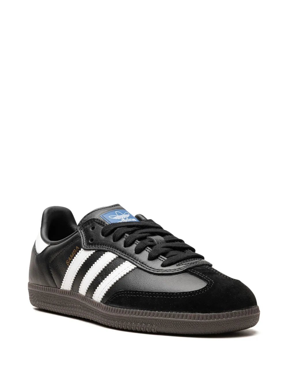 Black low-top sneakers with white triple stripes and blue tongue tab