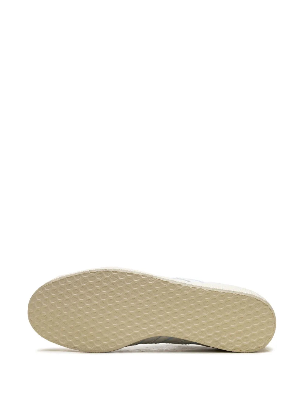 Textured rubber outsole for white low-top leather sneaker