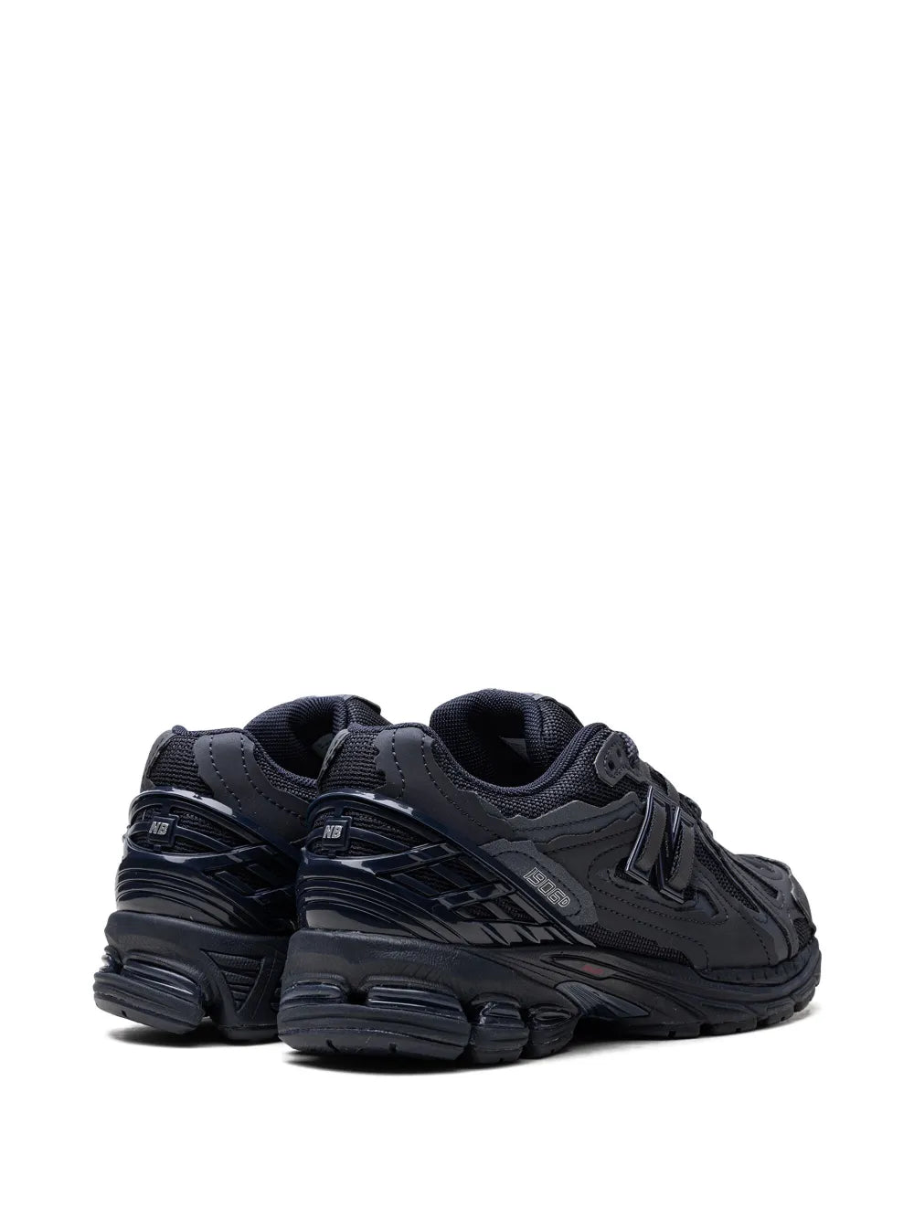 Black lace-up sneaker with rear quarter view and thick cushioned midsole
