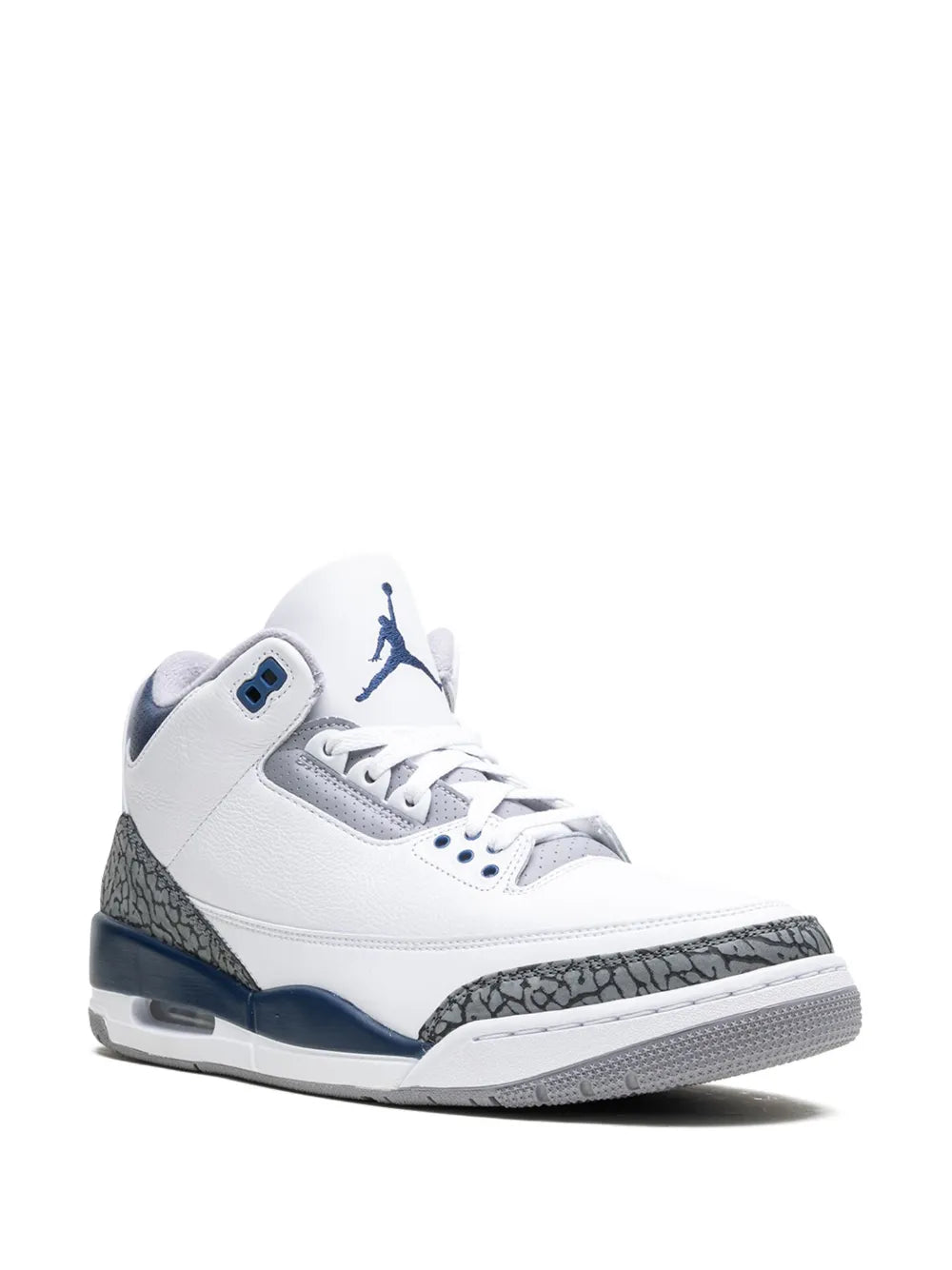 White mid-top sneakers with navy Jumpman logo and gray textured side panel