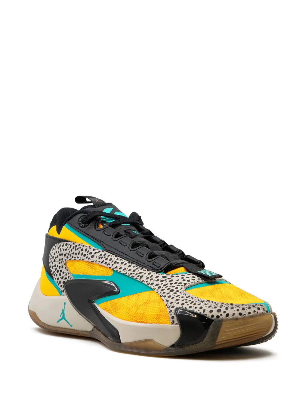 Black and yellow low-top sneakers with aqua accents, leopard-style panels, lace-up.