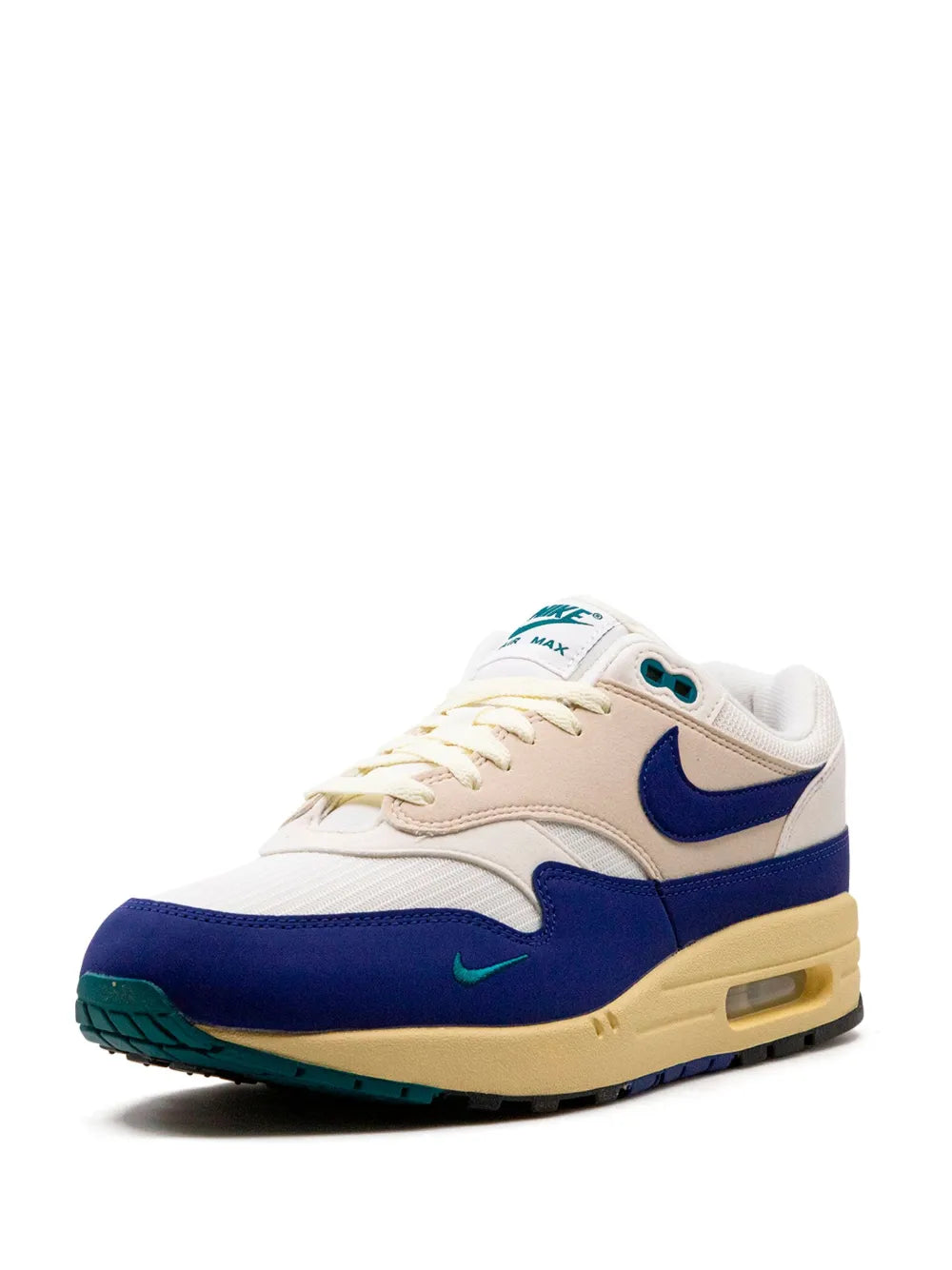 Nike Air Max 1 sneaker front-side angle, white and navy upper with teal logo accents