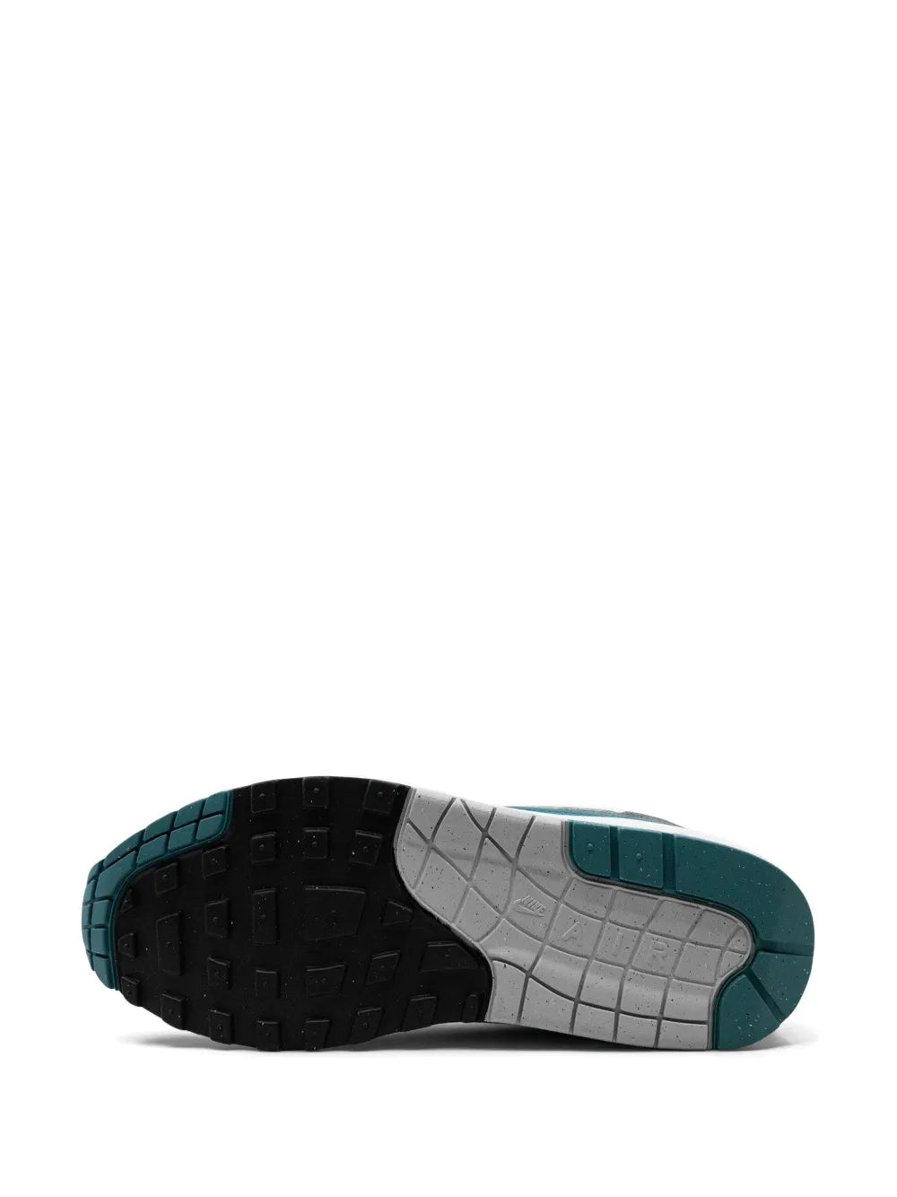 Nike Air Max 1 sneaker outsole, black traction tread with gray and teal panels