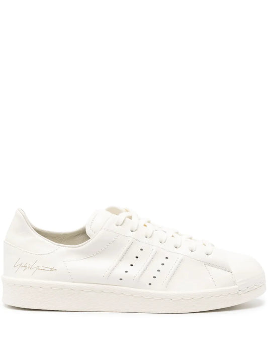Y-3 Superstar leather sneakers in white, front view with perforated 3-Stripes
