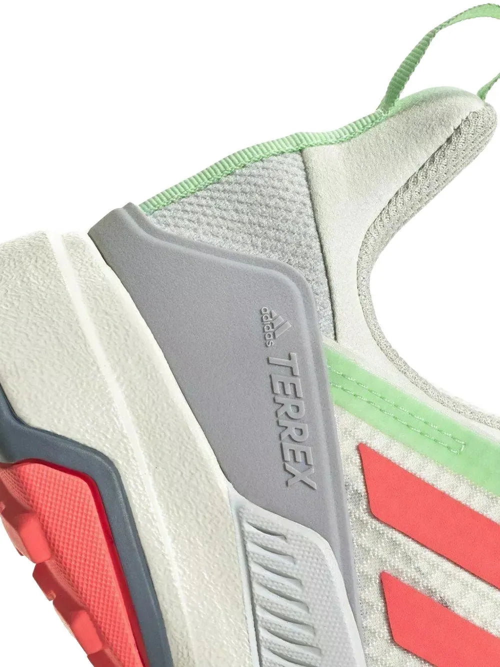 adidas Terrex trail shoe side close-up with red stripes and TERREX branding