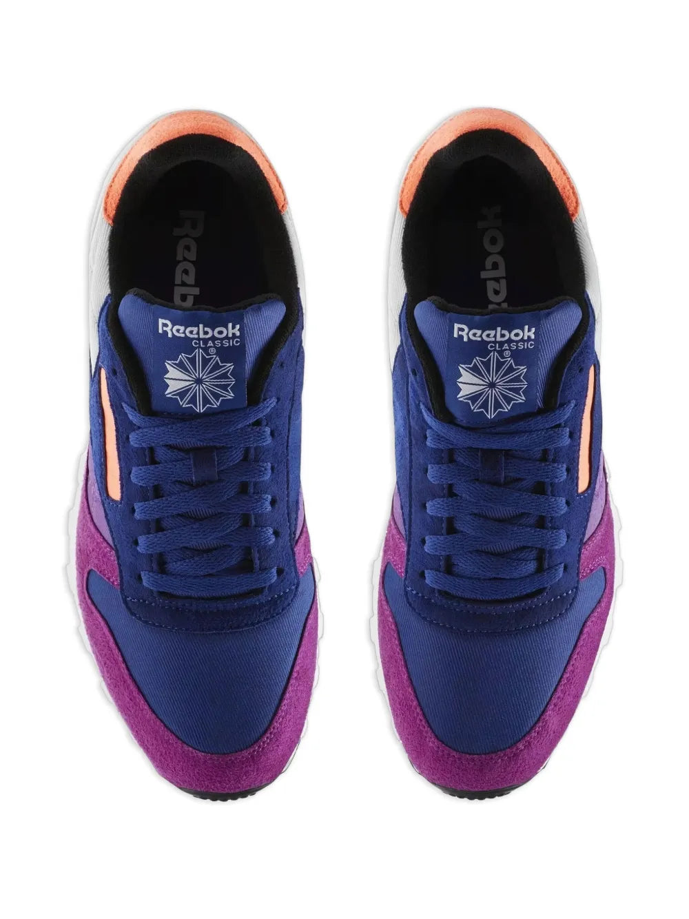 Reebok classic sneaker pair, purple and navy uppers with orange lining and lace detail