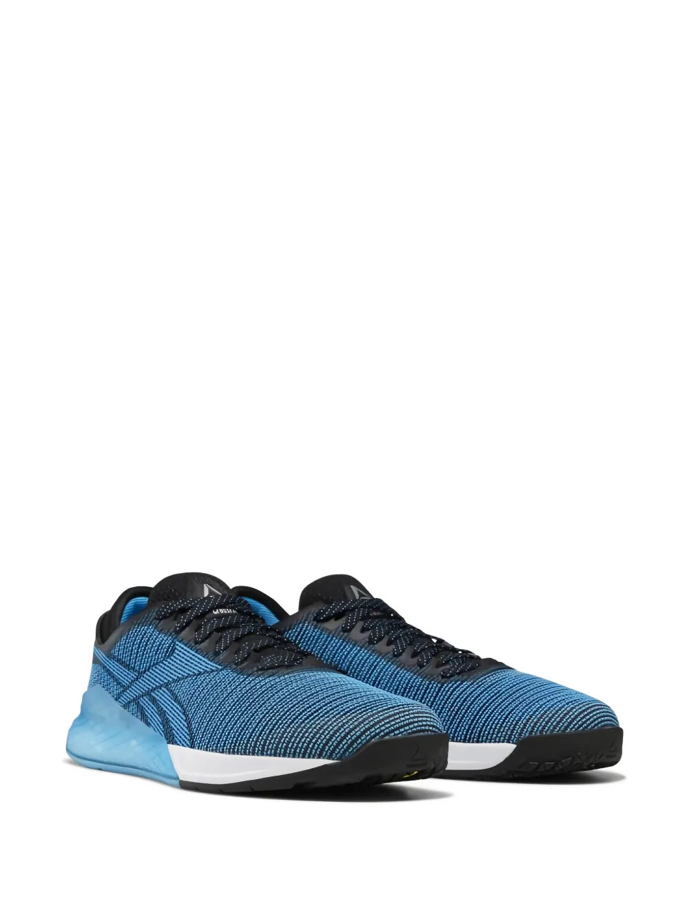 Blue knit running sneaker with black lace-up, side view, white sole