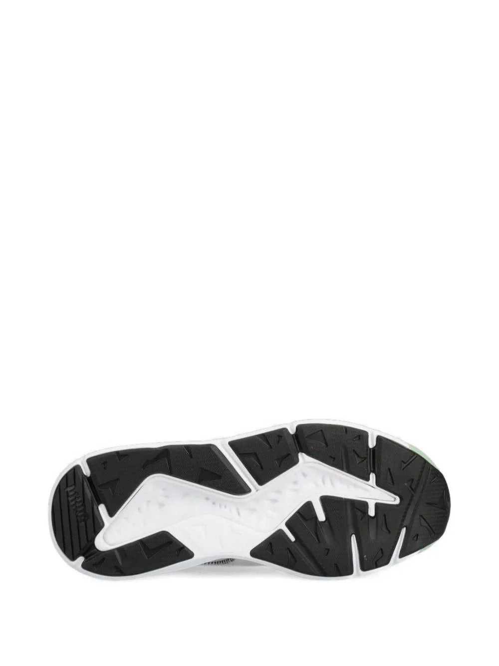 Rubber outsole with tread pattern in black and white, cushioned midsole base