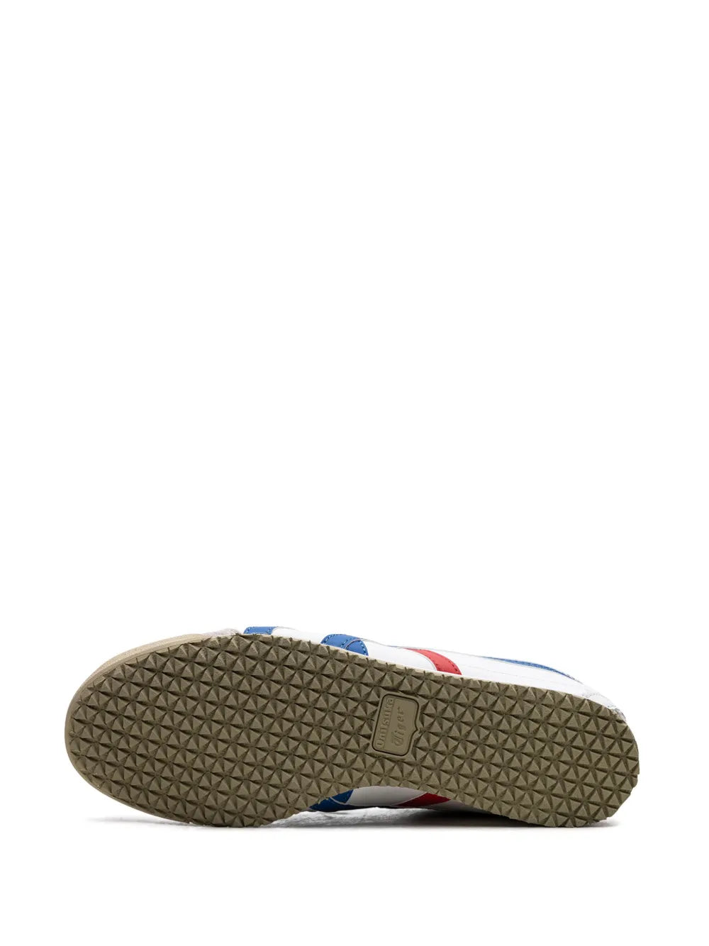 Textured rubber outsole tread, underside view of white low-top sneakers