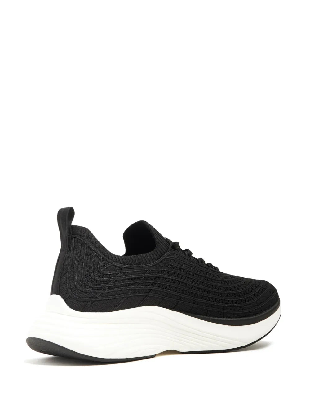 Black athletic sneaker with knit upper, white midsole, angled side view