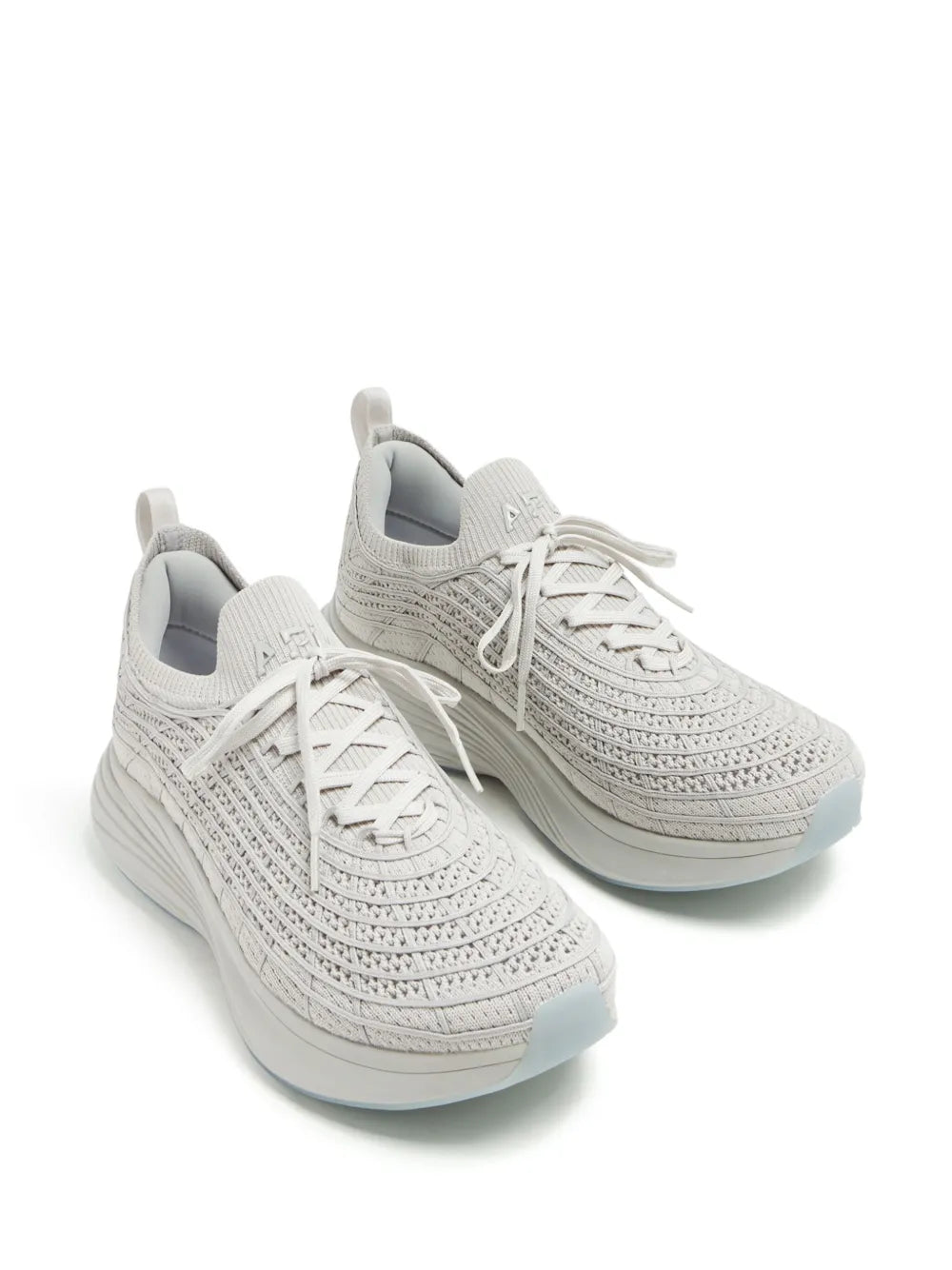 Light grey knit lace-up sneakers pair view with padded heel and cushioned sole