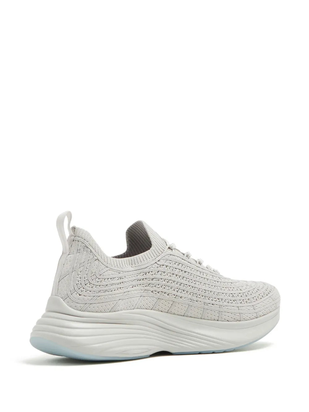 Light grey knit lace-up sneakers, angled side view with cushioned midsole