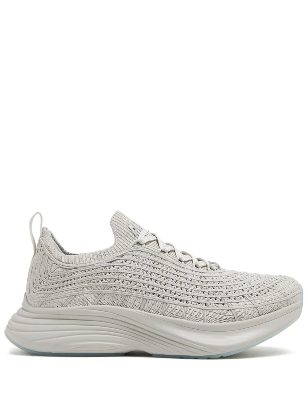 Grey knit athletic sneaker with lace-up front and cushioned white sole