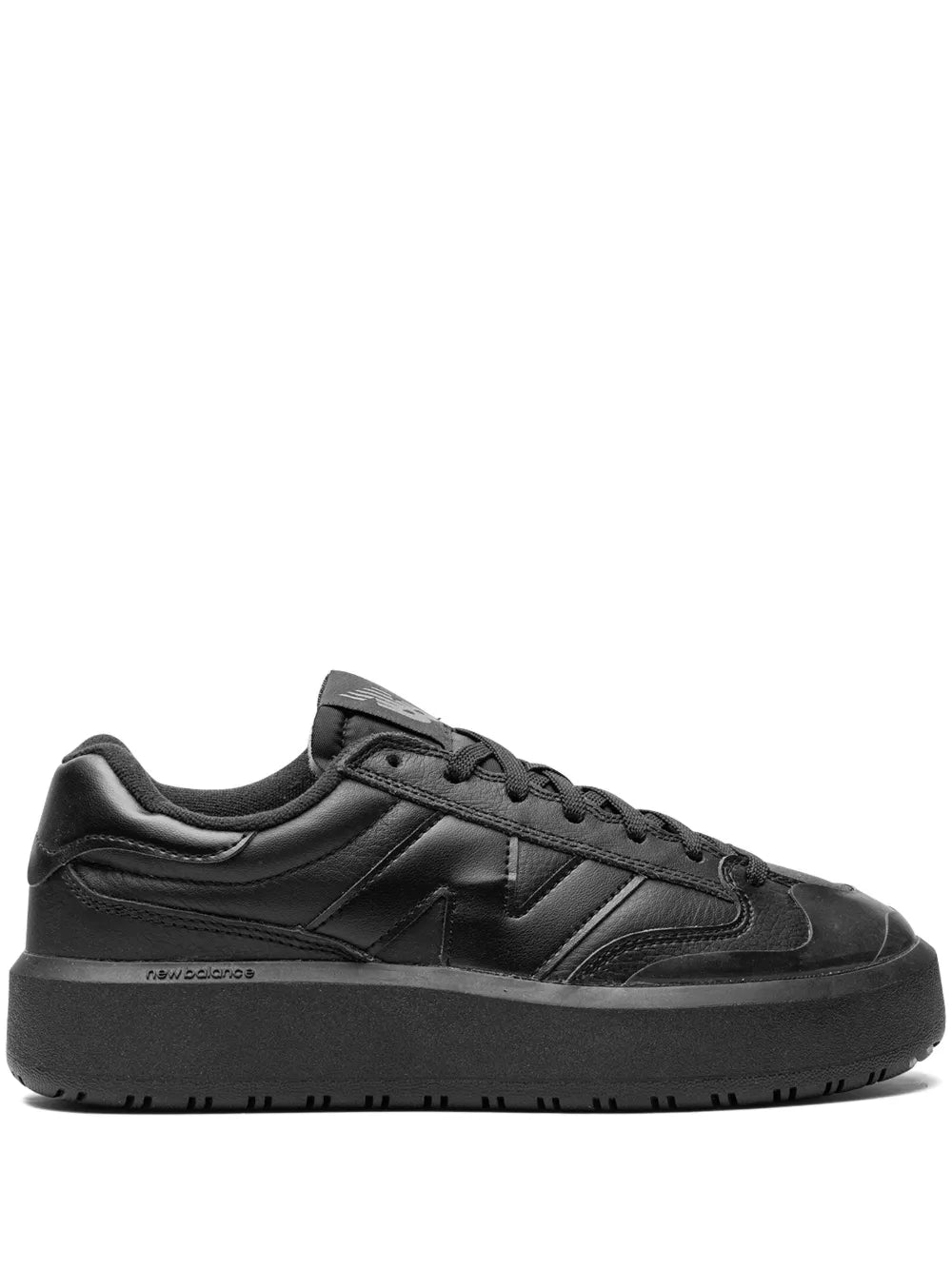 Black New Balance lace-up low-top sneakers with black upper and treaded rubber sole