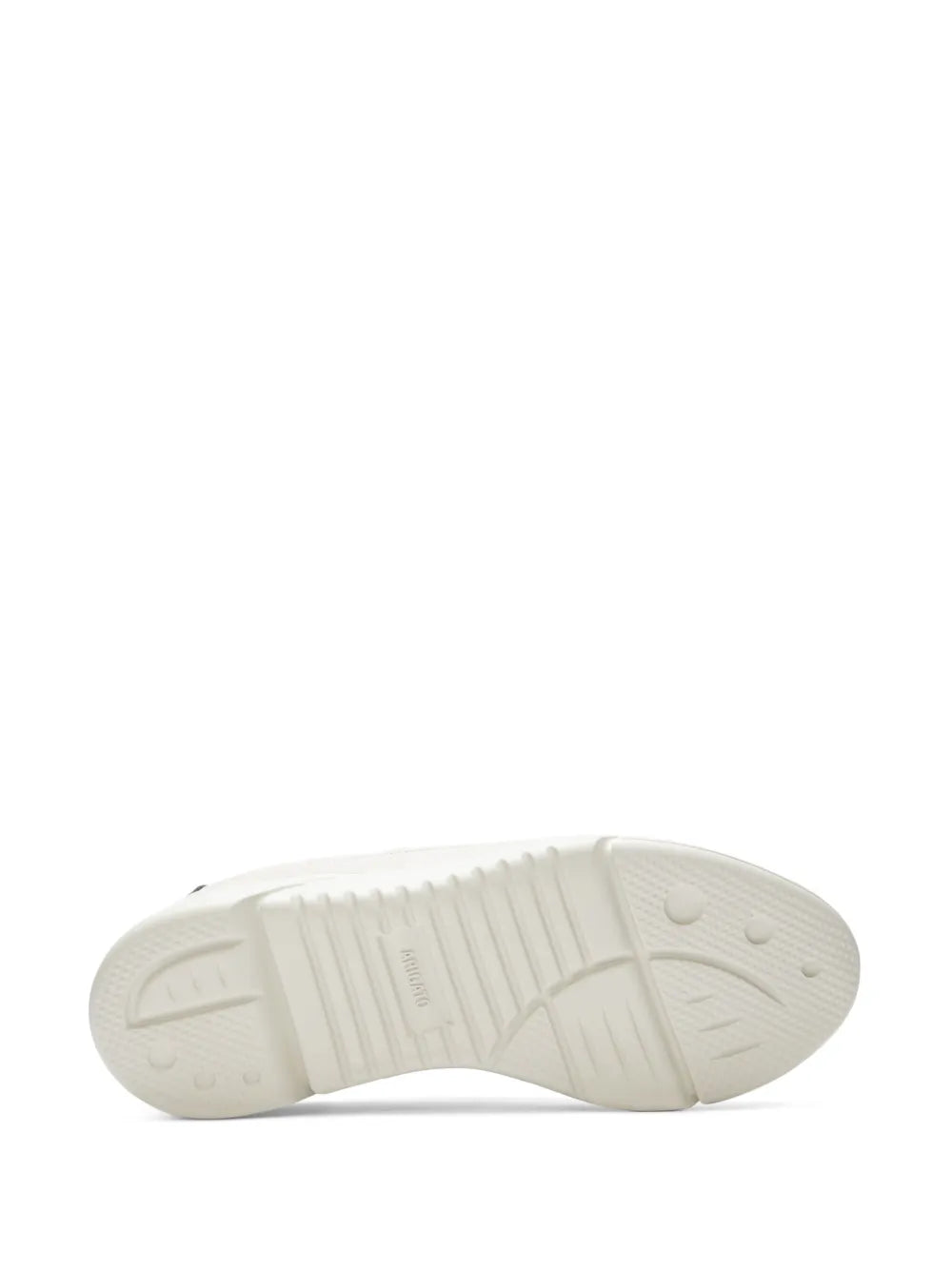 White rubber outsole of runner sneakers with textured tread