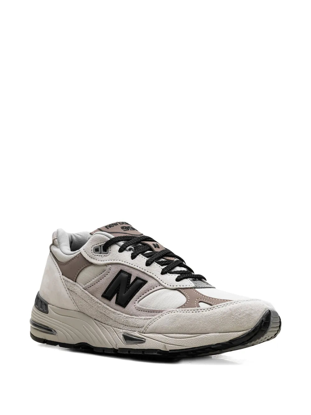 White New Balance 991 lace-up sneakers with gray suede panels and black accents
