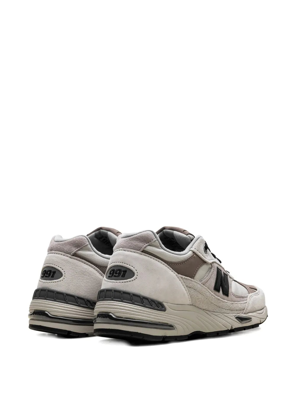 New Balance 991 sneakers rear view with cushioned heel and molded outsole