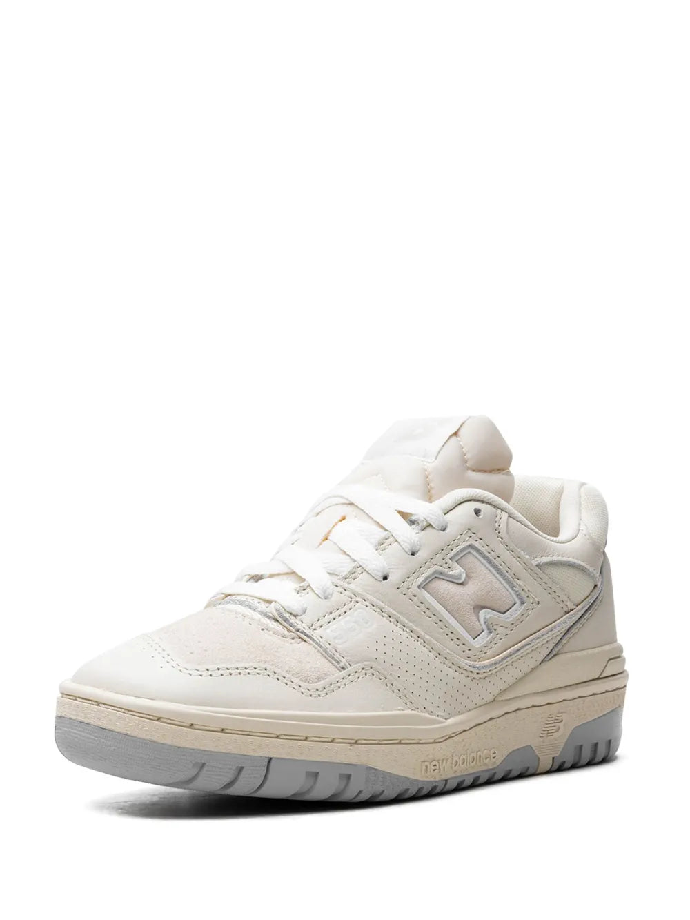New Balance 550 white/cream lace-up sneakers, front-side view with lace-up eyelets