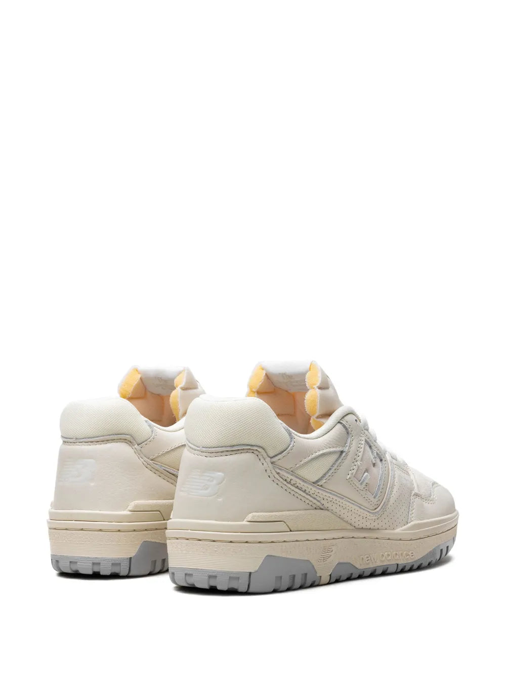 New Balance 550 white/cream sneakers, back view with stacked heel and rubber outsole