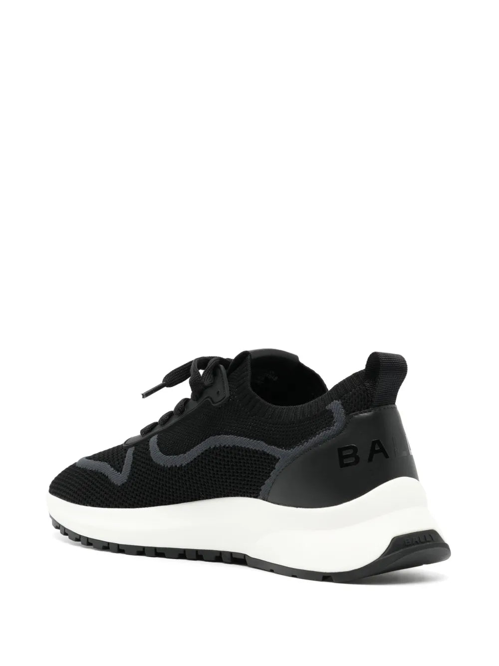 Black mesh sneaker with textured knit pattern, white midsole, rear branding on heel