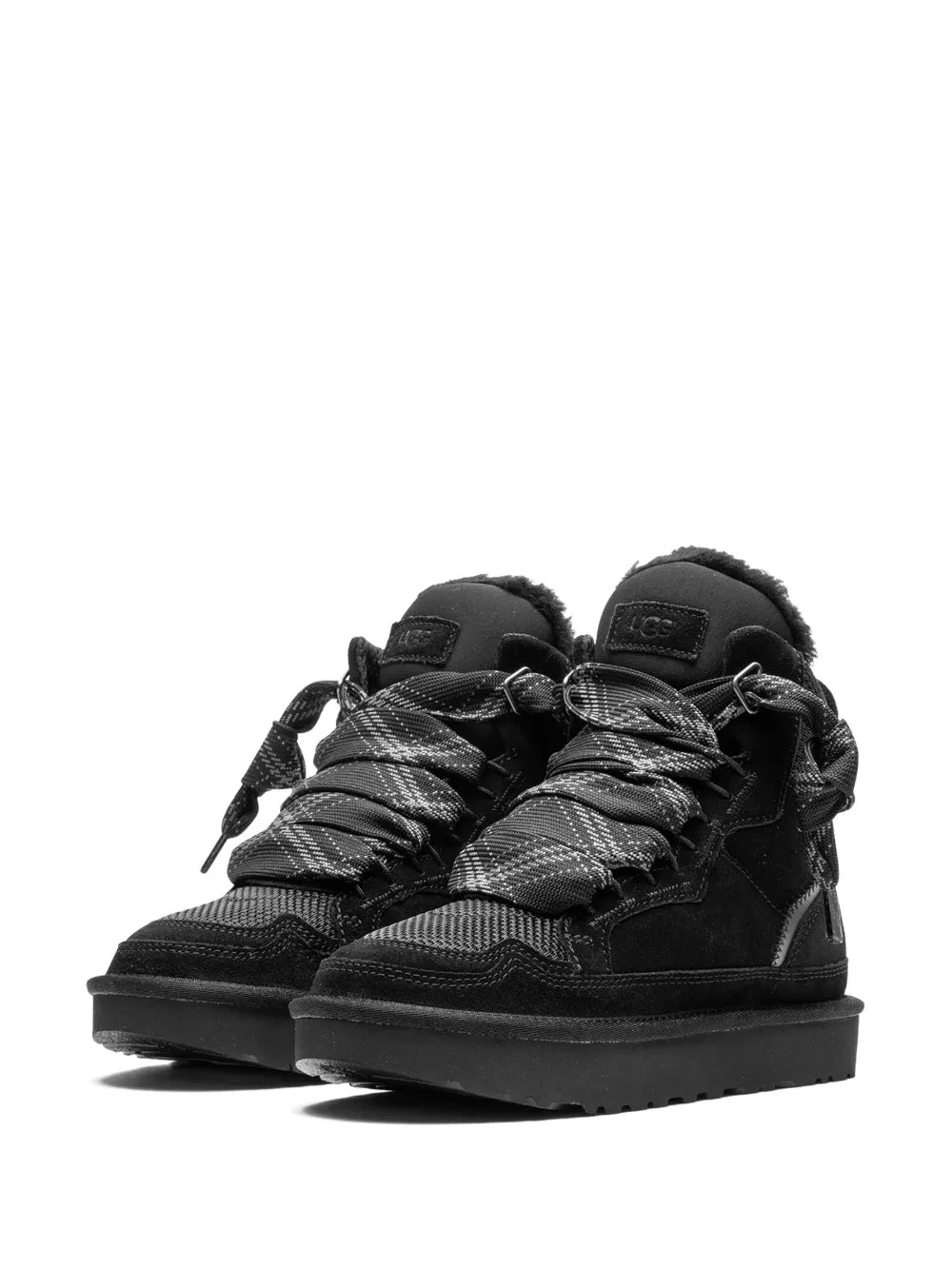 Pair of black suede lace-up boots with patterned laces and thick rubber sole