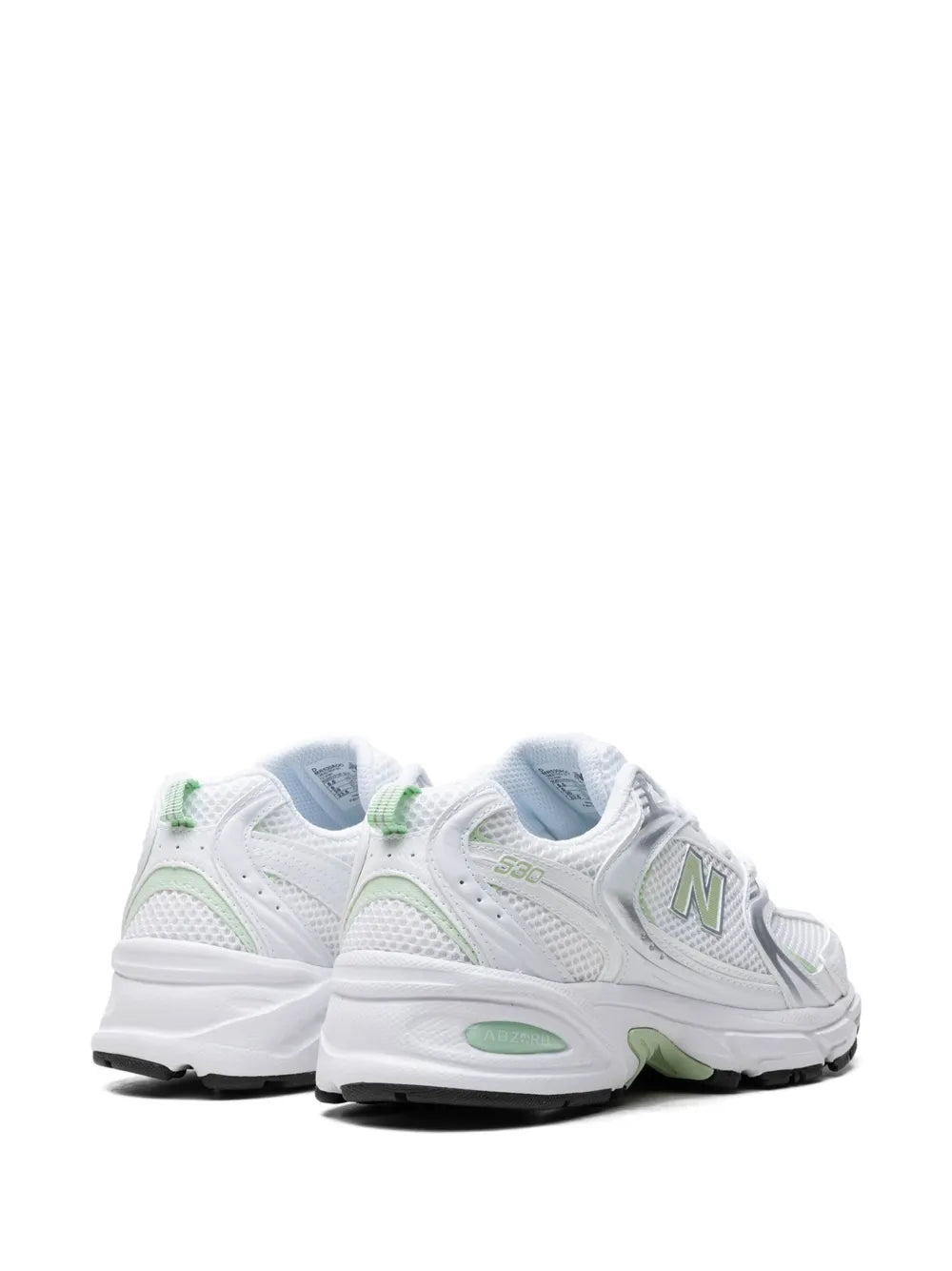 New Balance sneakers, white and mint green, rear side view with heel tabs