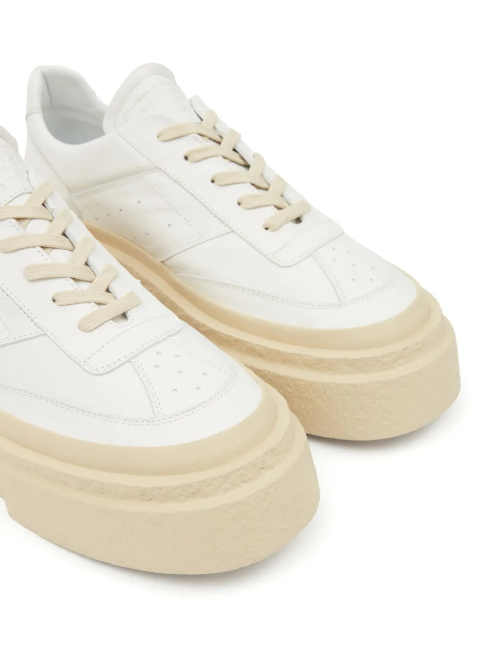 Mm6 Maison Margiela chunky leather sneakers close-up, white leather laces and side panel