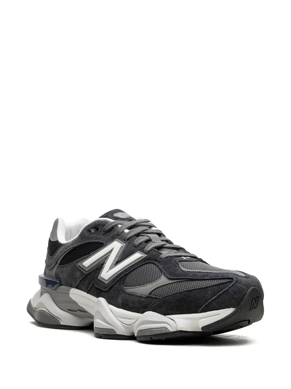 New Balance dark grey lace-up sneakers, side view with prominent 'N' and chunky midsole