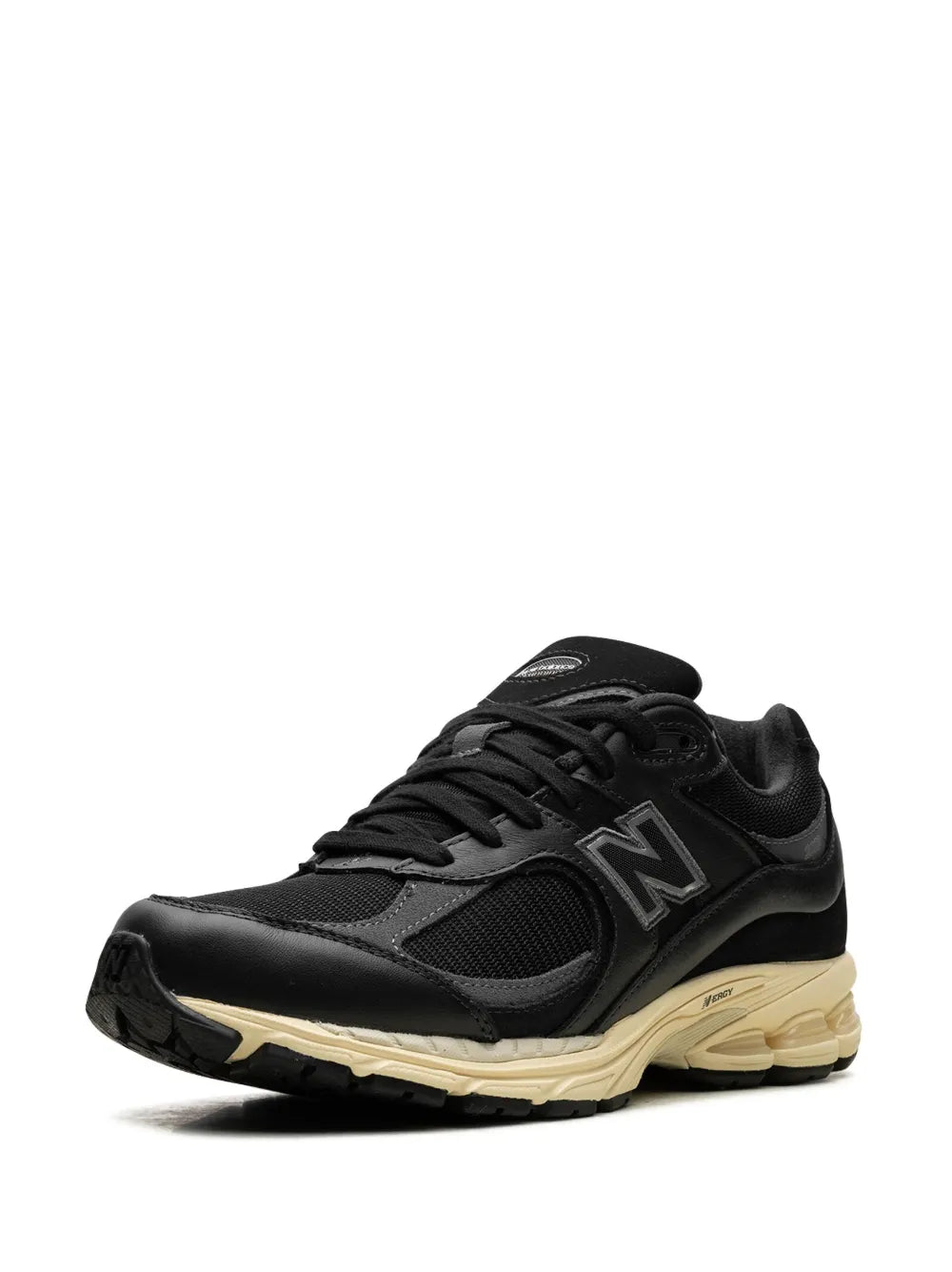 Black New Balance 2002R low sneakers with N logo, lace-up, cream midsole