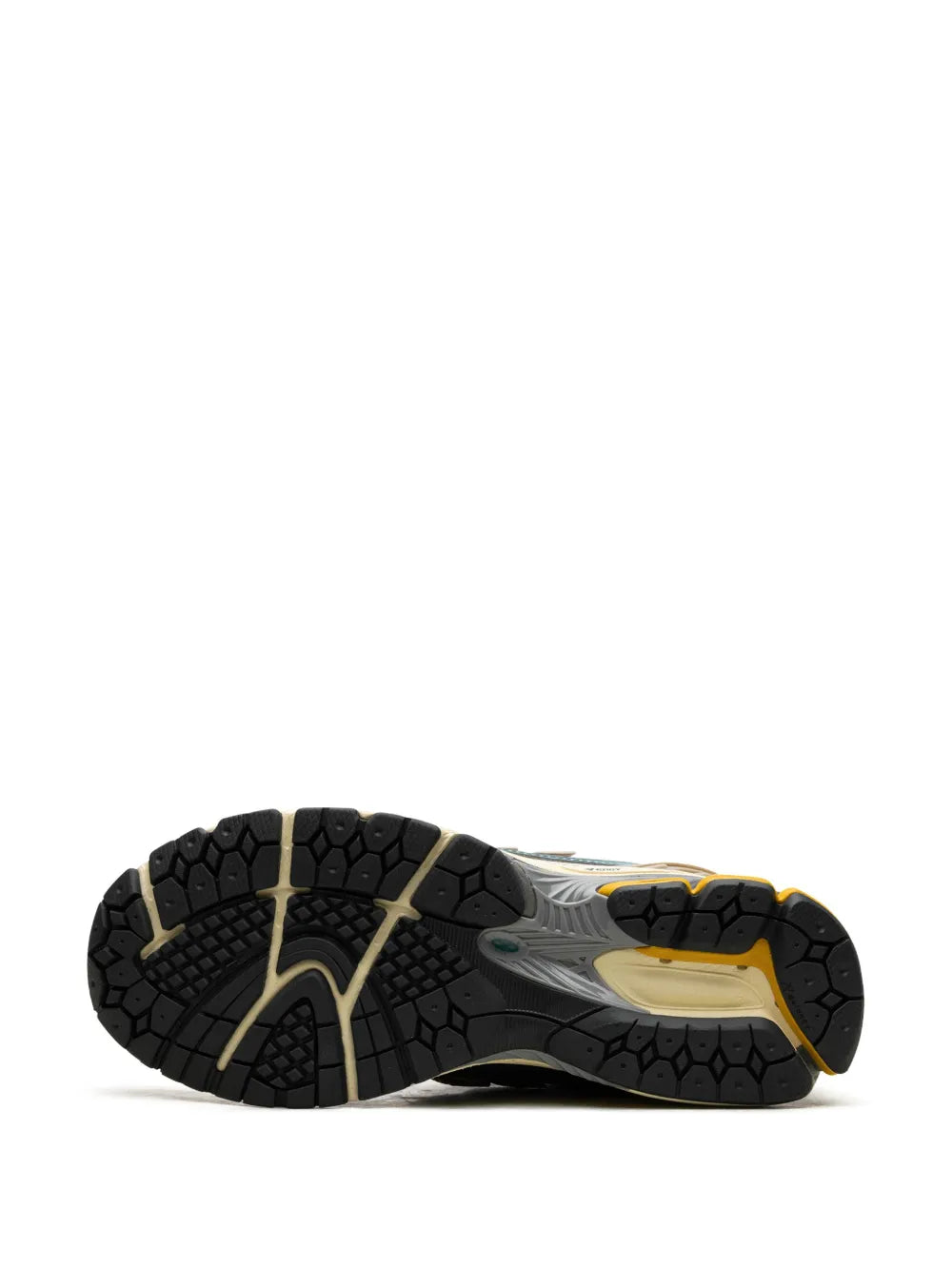 New Balance 1906R outsole tread, black rubber with yellow center stripe
