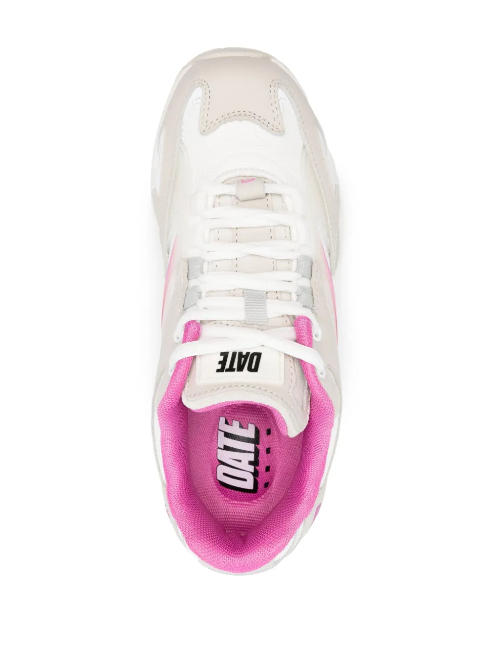 Beige low-top sneaker with pink tongue label at laces, front view
