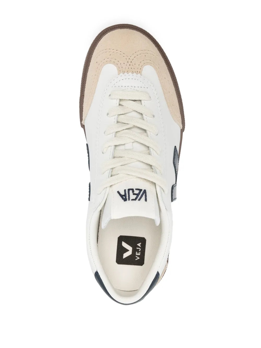 White lace-up sneakers with navy heel tab and VEJA branding on the tongue