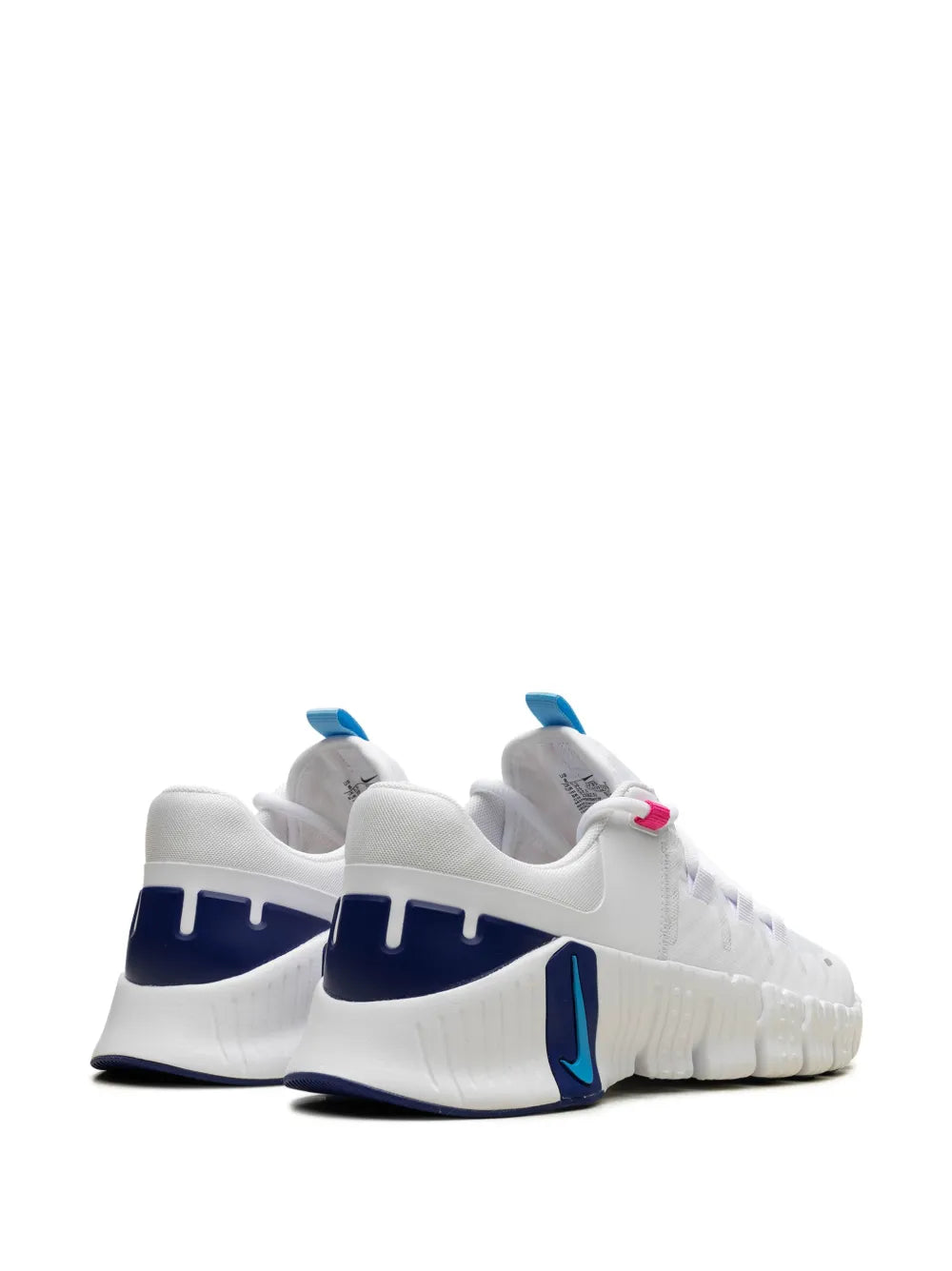 Nike white training shoe with blue heel panels, lace-up closure, cushioned sole