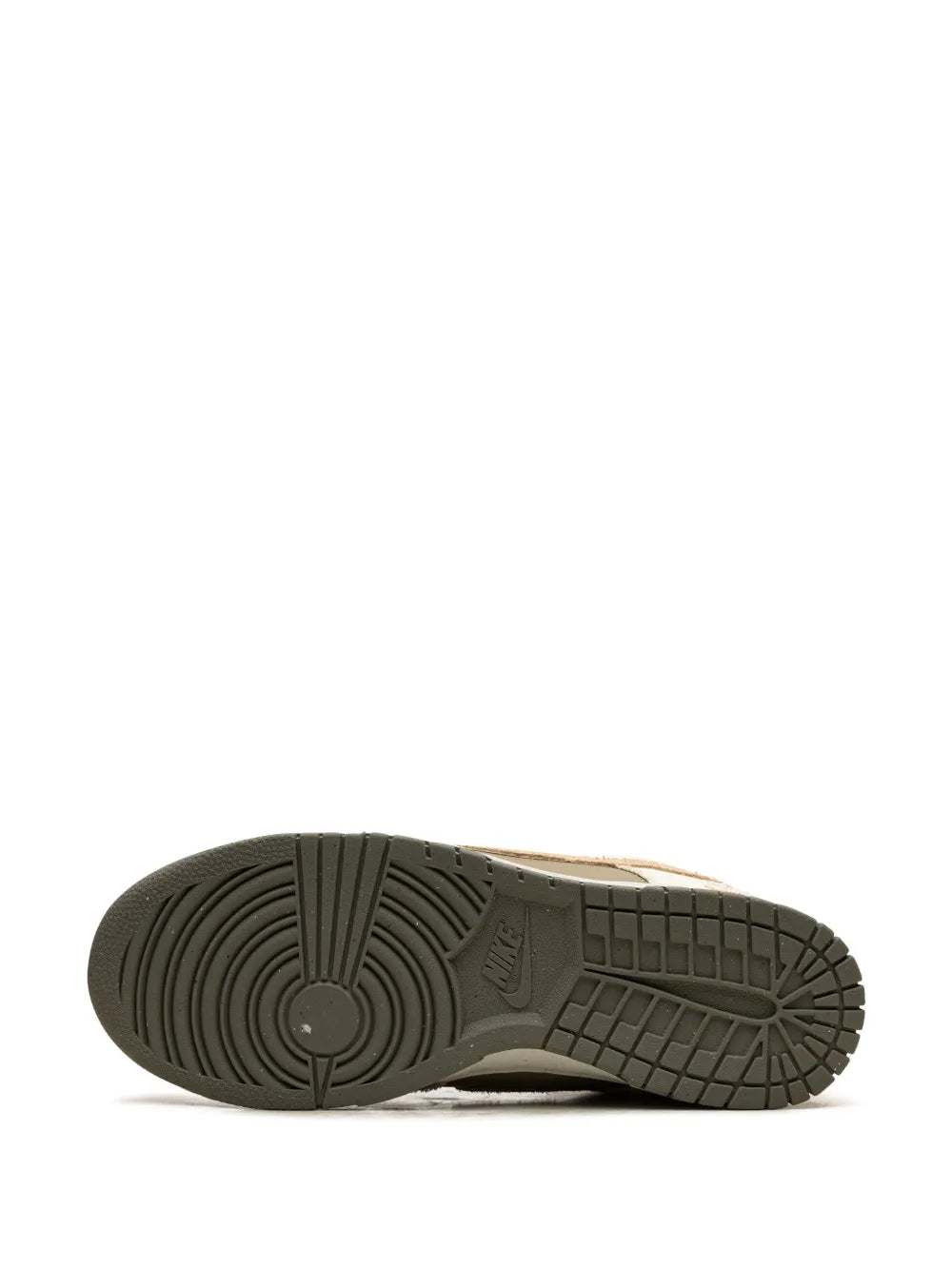 Nike Dunk Low sneaker outsole view, textured tread with beige upper edge