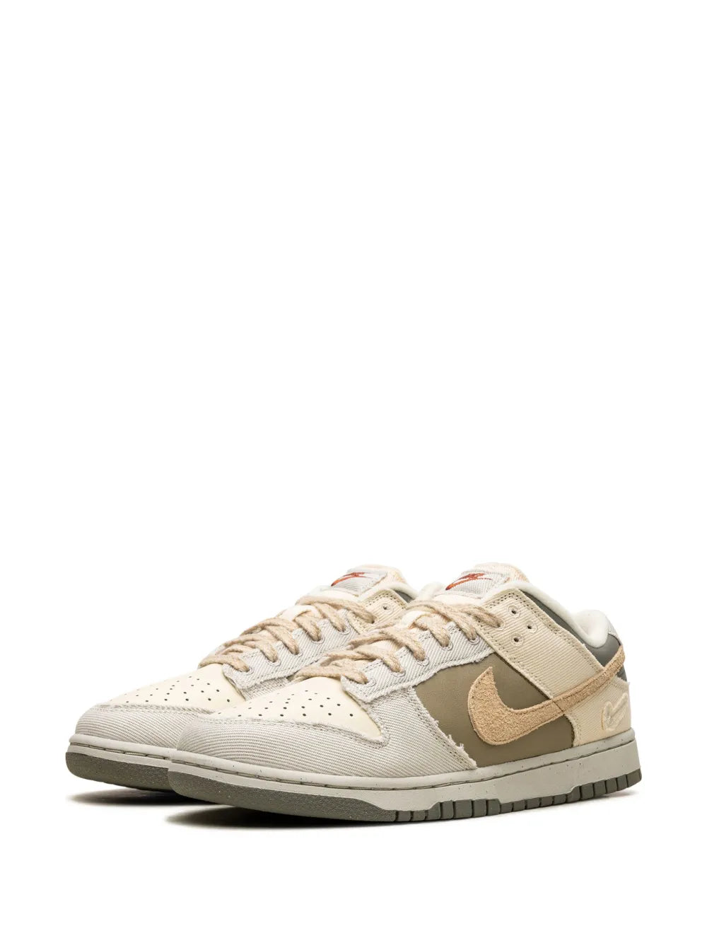 Nike Dunk Low sneakers with lace-up front, beige panels and tan Swoosh
