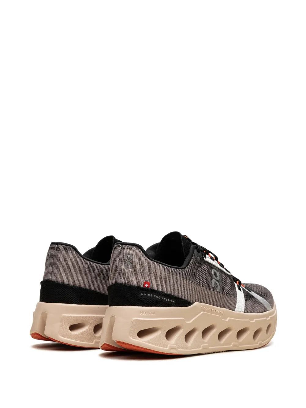 Grey On running shoes, rear 3/4 view, black collar, cream cushioned sole