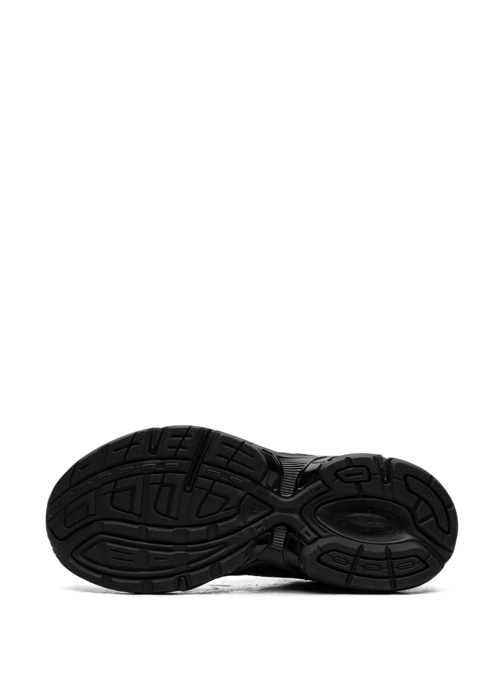 Black rubber outsole with textured traction pattern for sneakers