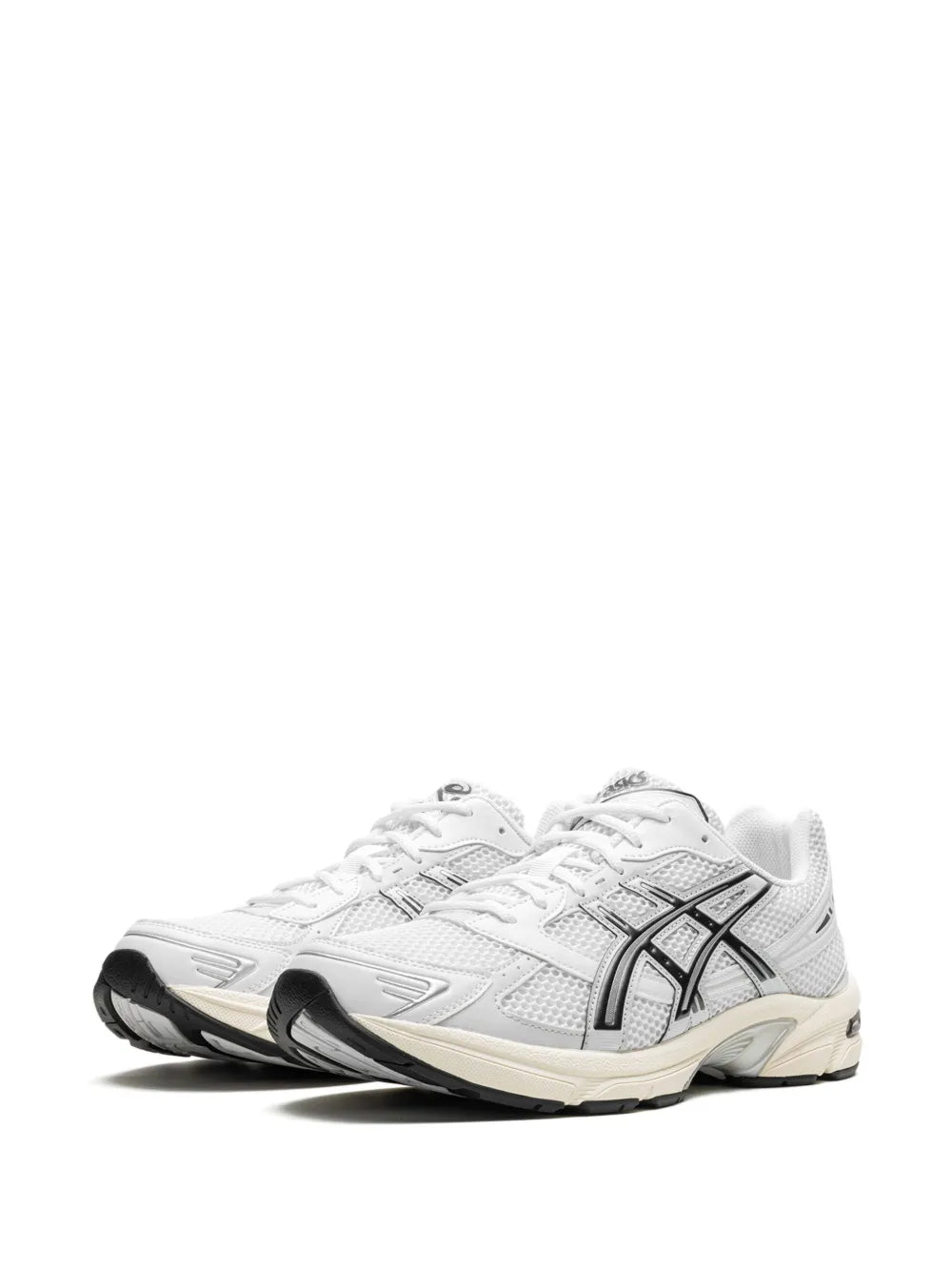 White lace-up sneakers with black Asics logo and cushioned sole